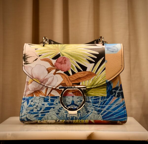 blue and brown floral leather handbag